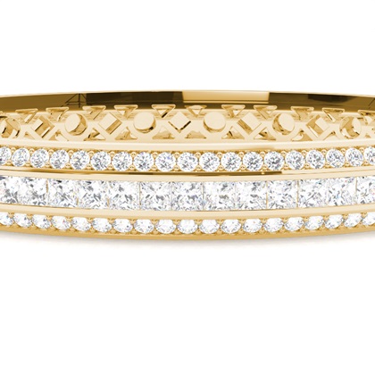 Runde und Princess Diamanten Kanal gefasst in einem Armreifen