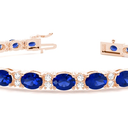 Tennisarmband in 4 Krappenfassung mit blauem Saphir