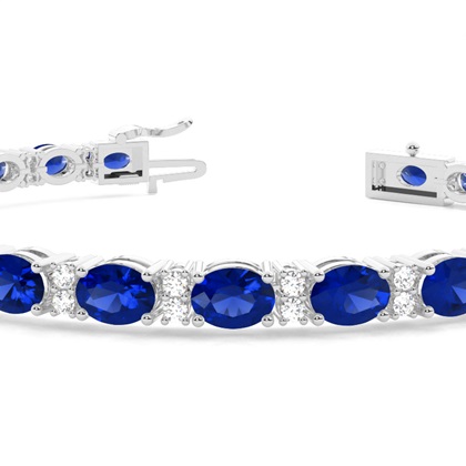 Tennisarmband in 4 Krappenfassung mit blauem Saphir