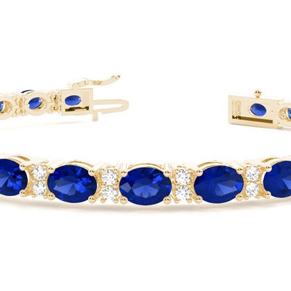 Tennisarmband in 4 Krappenfassung mit blauem Saphir