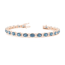 Ovales Tennisarmband mit blauem Topas in 4 Krappenfassungen