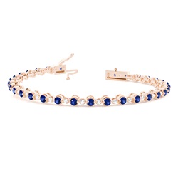 Rundes Tennisarmband in einer 2-Krappen-Fassung mit blauem Saphir