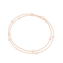 Runde, zarte Diamantarmbänder in einer Lünette