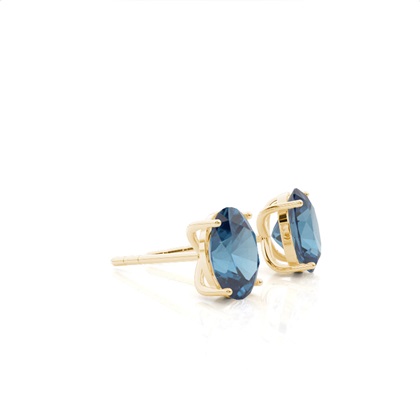 Ovale Blautopas-Ohrstecker in einer 4er Krappenfassung