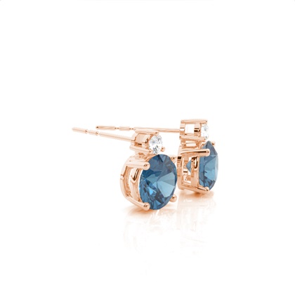 4 Prong Setting Oval Blue Topaz Stud Earring