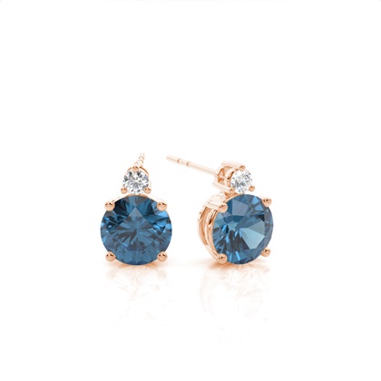 4 Prong Setting Oval Blue Topaz Stud Earring