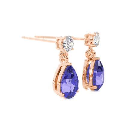 Tropfenförmige Tansanit Ohrringe in einer Krappenfassung