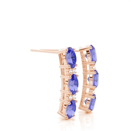 Ovale Tansanit-Ohrringe in einer Krappenfassung