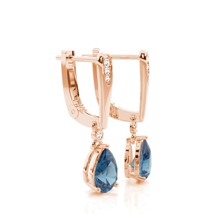 TropfenfÃ¶rmige Blau Topas Ohrringe in einer Krappenfassung