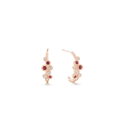 Ruby and round diamond bezel set half hoop earring