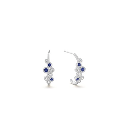 Blue sapphire and round diamond bezel set half hoop earring