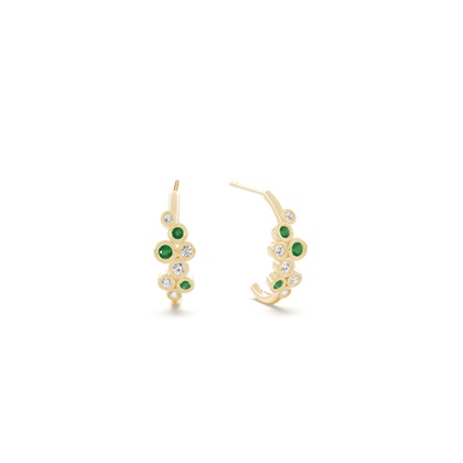 Emerald and round diamond bezel set half hoop earring