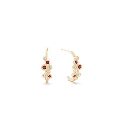 Ruby and round diamond bezel set half hoop earring