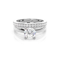 Diamant Verlobungsring in einer Krappenfassung mit passenden Ring