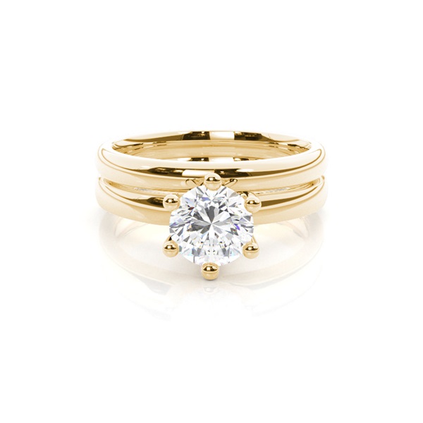 Diamant Verlobungsring in einer Krappenfassung mit passenden Ring