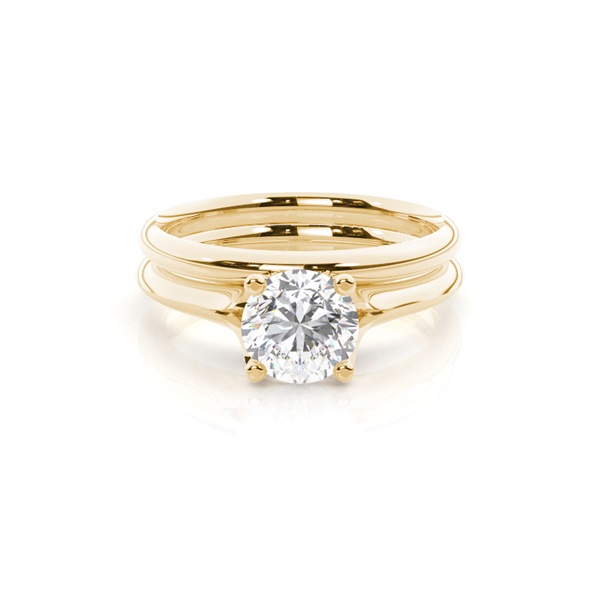 Diamant Verlobungsring in einer Krappenfassung mit passenden Ring