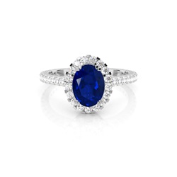 Ovaler Halo Blauer Saphir Verlobungsring