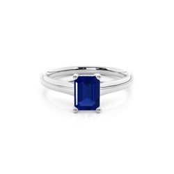 4-Stift-Verlobungsring in Smaragdform mit blauem Saphir