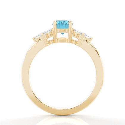 Ovaler Blautopas Ring mit drei Steinen in einer Krappenfassung