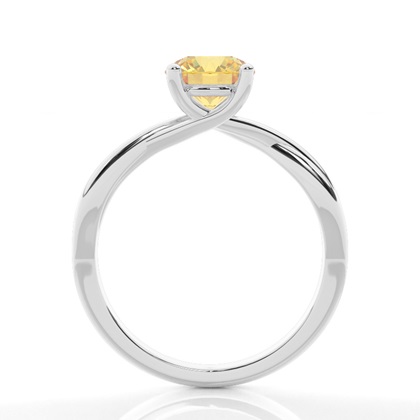 Gelber Diamantring in Krappenfassung