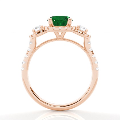 Zinkeneinstellung runder Smaragd-Drei-Stein-Ring