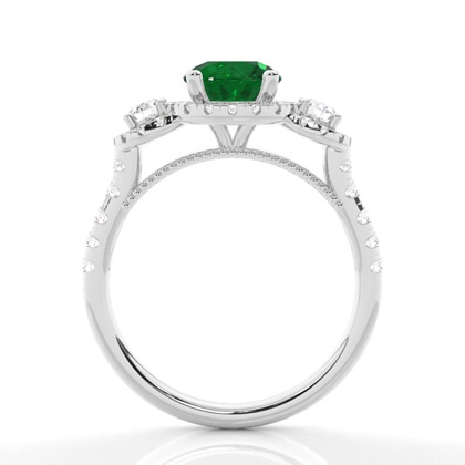 Zinkeneinstellung runder Smaragd-Drei-Stein-Ring