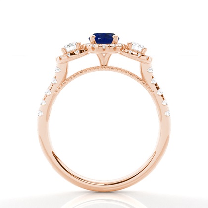 Zinkeneinstellung Ovaler blauer Saphir-Drei-Stein-Ring