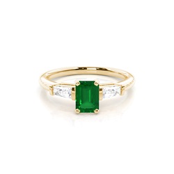 Prong Setting Emerald Side Stone Ring