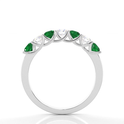 Zinkeneinstellung runder Smaragd halber Ewigkeitsring