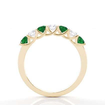 Zinkeneinstellung runder Smaragd halber Ewigkeitsring