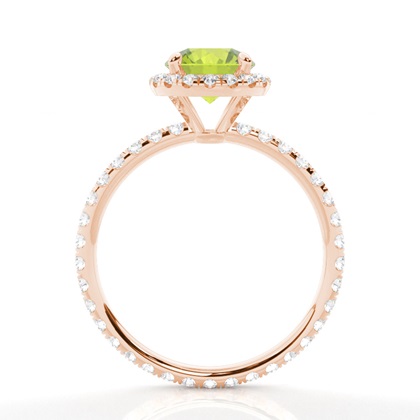 Runder Peridot Ring mit Seitensteinen in einer Krappenfassung