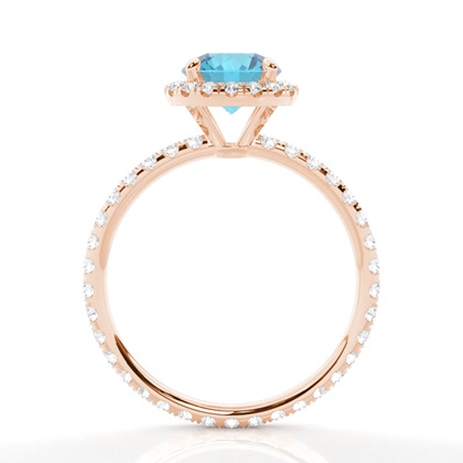 Runder Blautopas Ring mit Seitensteinen in einer Krappenfassung