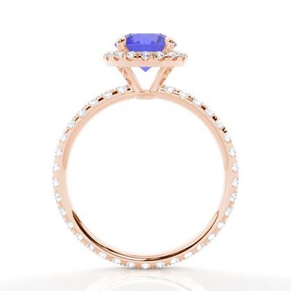 Runder Tansanit Ring mit Seitensteinen in einer Krappenfassung