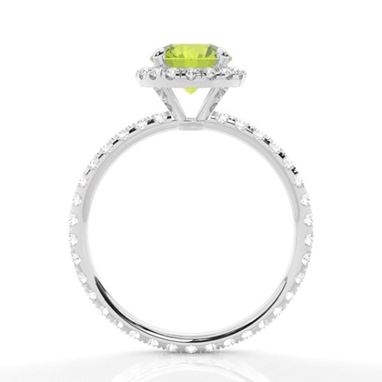 Runder Peridot Ring mit Seitensteinen in einer Krappenfassung