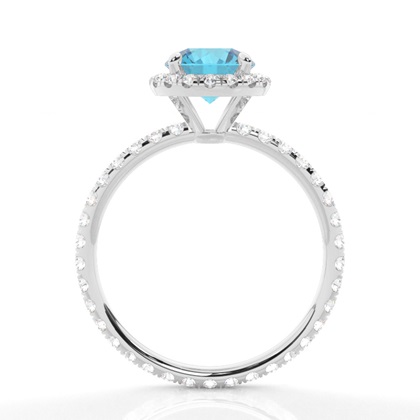 Runder Blautopas Ring mit Seitensteinen in einer Krappenfassung