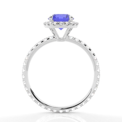 Runder Tansanit Ring mit Seitensteinen in einer Krappenfassung