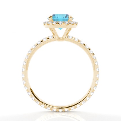 Runder Blautopas Ring mit Seitensteinen in einer Krappenfassung