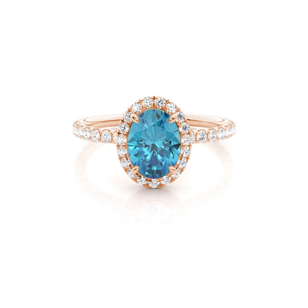 Prong Setting Oval Blue Topaz Side Stone Ring