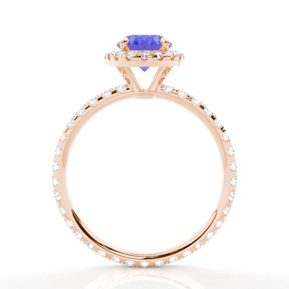 Ovaler Tansanit Ring mit Seitensteinen in einer Krappenfassung