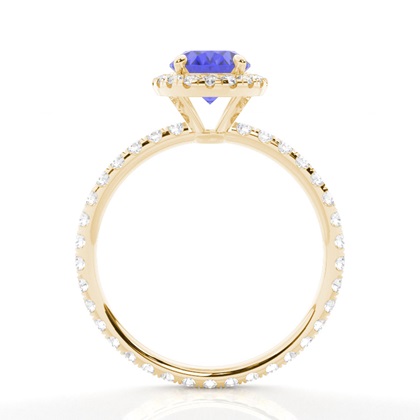 Ovaler Tansanit Ring mit Seitensteinen in einer Krappenfassung