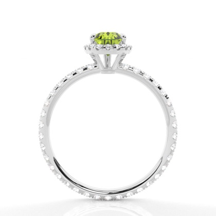 Tropfenförmiger Peridot Ring mit Seitensteinen in einer Krappenfassung