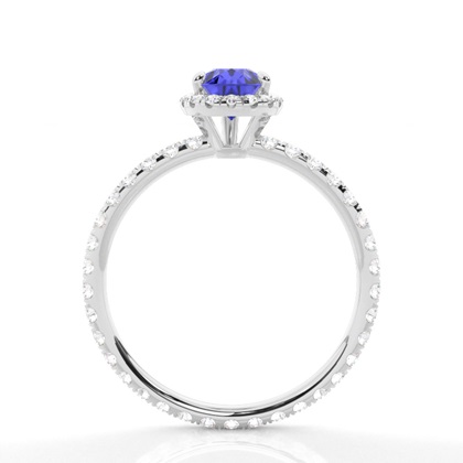 Tropfenförmiger Tansanit Ring mit Seitensteinen in einer Krappenfassung