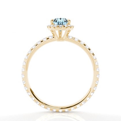 Tropfenförmiger Aquamarin Ring mit Seitensteinen in einer Krappenfassung