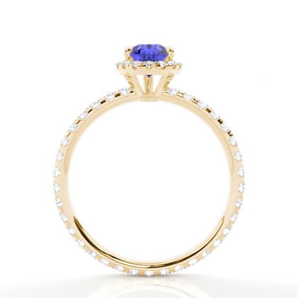 Tropfenförmiger Tansanit Ring mit Seitensteinen in einer Krappenfassung