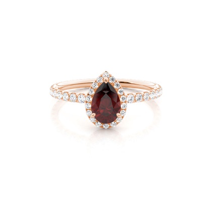 Prong Setting Pear Garnet Side Stone Ring