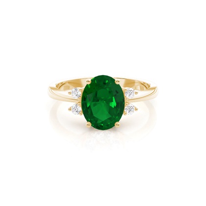 Prong Setting Emerald Side Stone Ring