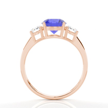 Tansanit-Ring mit drei Steinen in einer Krappenfassung