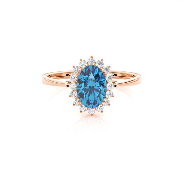 Oval Blue Topaz Halo Engagement Ring
