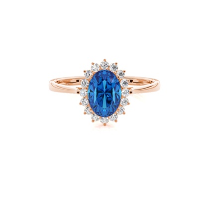 Oval Blue Topaz Halo Engagement Ring