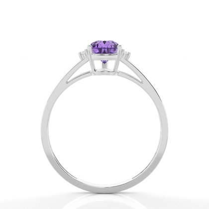 Pear Tanzanite Verlobungsring mit Seitensteinen in einer Krappenfassung